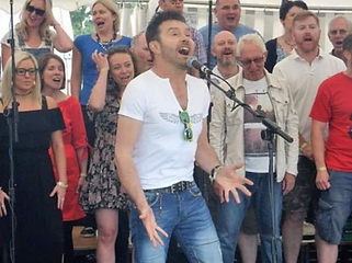 David performing at a show
